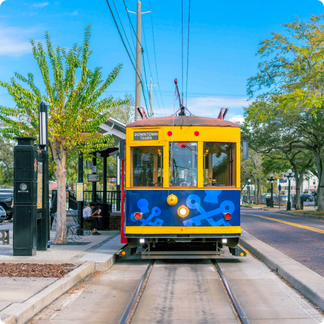tampa street car trolley parked at a stop in ybor city, located in tampa medical and research district